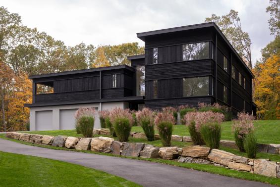 Pioneer Millworks Shou Sugi Ban Larch Carbon Siding on Residence in CT. Photos by Kevin Kraut
