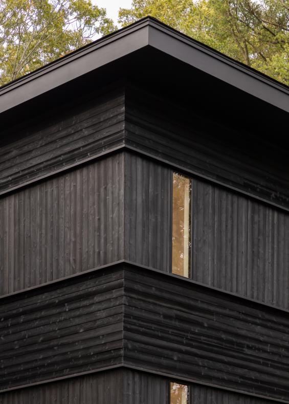 Pioneer Millworks Shou Sugi Ban Larch Carbon Siding on Residence in CT. Photos by Kevin Kraut