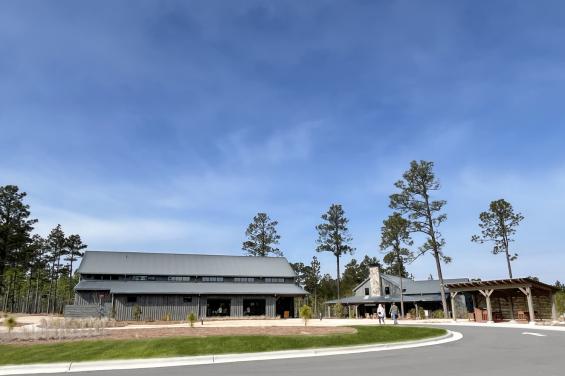 Pioneer Millworks Farmed Board Siding, and Modern Farmhouse White Oak Flooring in 5% White at Pinehurst #10 Proshop
