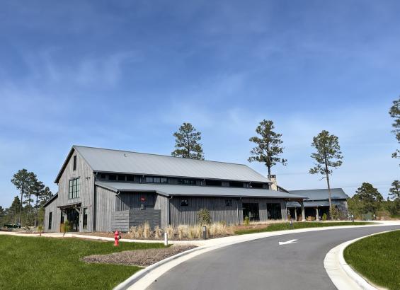 Pioneer Millworks Farmed Board Siding, and Modern Farmhouse White Oak Flooring in 5% White at Pinehurst #10 Proshop