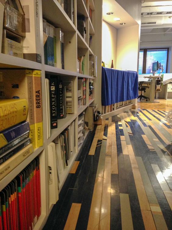 Pioneer Millworks reclaimed gym flooring in a black/grey mix.